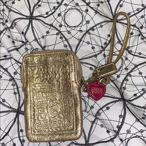 Coach Gold wrist wallet used